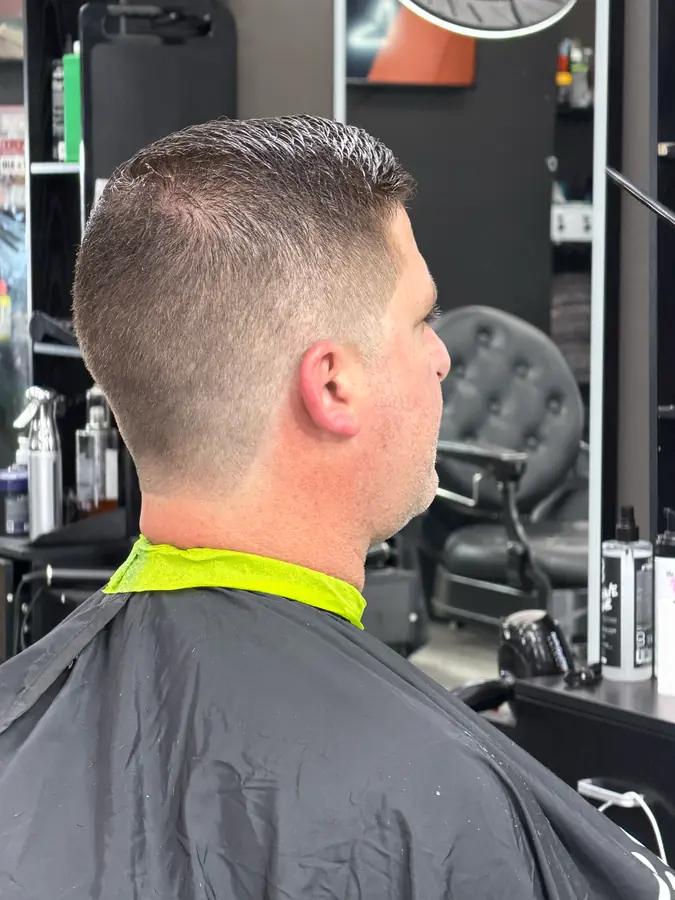 Short buzz with a skin-faded back and a mapped neckline