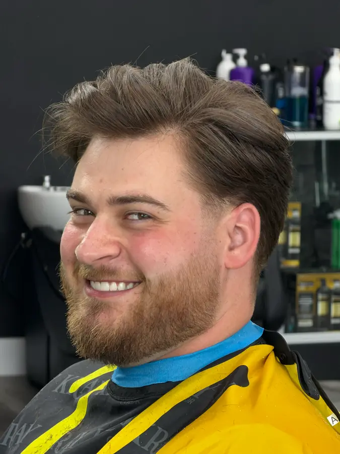 Volume on top over a tight fade